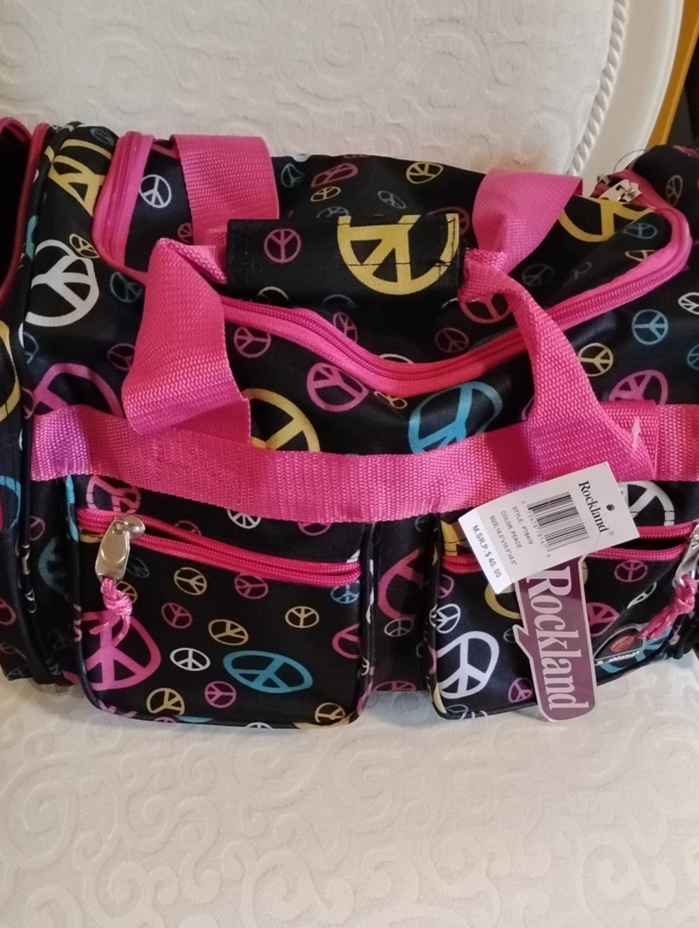 Black Travel Duffel Bag with Pink Trim and Peace Sign Print
